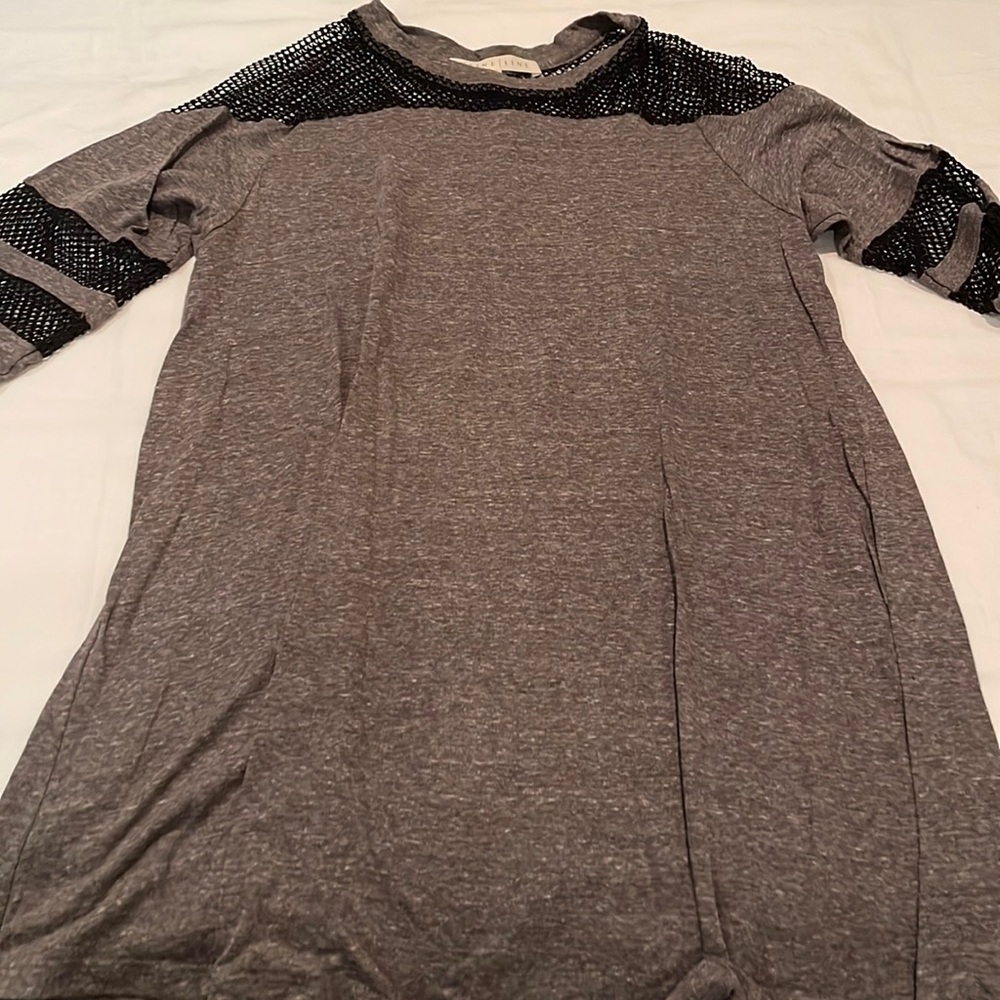 Never worn. Varsity t shirt with mesh detail.